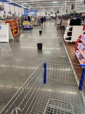 Buckets catching rain all over the store