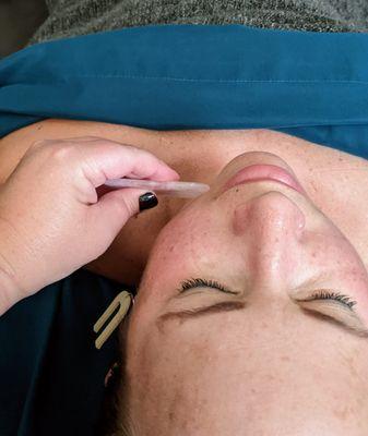 face massage with gua sha