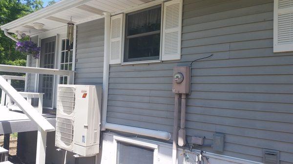 Mitsubishi Hyper heat, heat pump installed in an all electric country home.