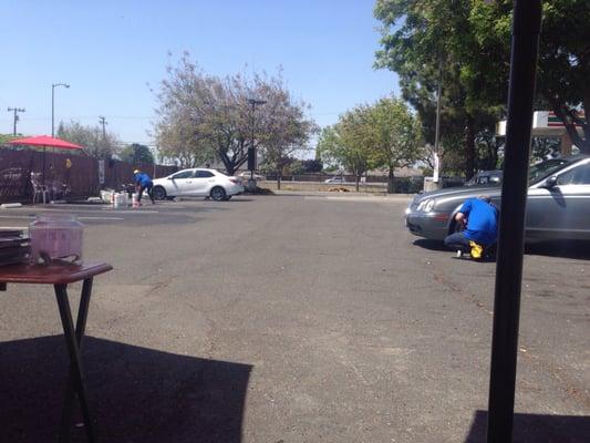 Car wash on the side parking lot.