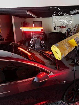 Accelerating the drying process on this 2020 Tesla model 3 windshield tint.