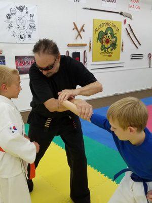 Grand Master Fred Weeks doing what he loves the most, helping kids!