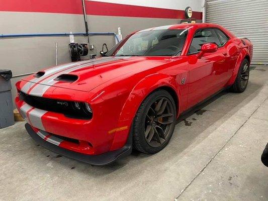 Hellcat Challenger In For A Platinum Detail And Ceramic Paint Sealant.  We Also Repaired And Refinished Some Damage On The Alloy Wheels.