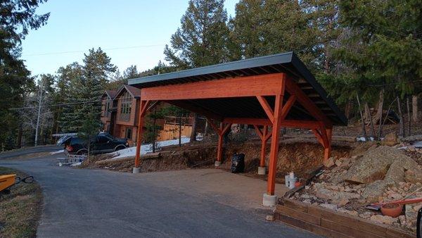 Carport paint and stain beams and post.