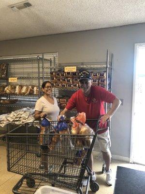 Volunteers stocking bread