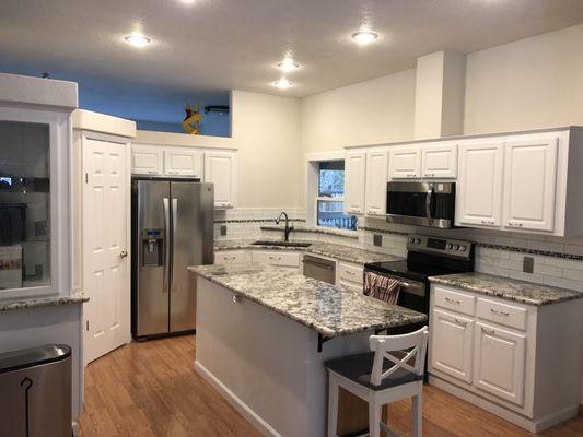 Kitchen, new cab, granite, sink, faucet, paint, pull out shelves, backsplash.