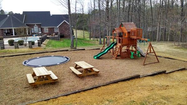 Amazing underground trampoline/playground install. Yes, we do more than just cut grass!