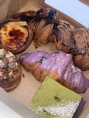 Choco Lava Croissant  Noir Sesame Croissant Ube Coconut Lava Croissant  Uji Matcha Lava Cube  OG Breakfast Danish  Creme Brulee Flan