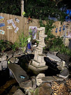 The beautiful fountain we bought to install in our koi pond. We enjoy the sound of the waterfalls.