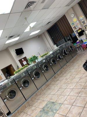 Very spacious area. Washers and kids area.