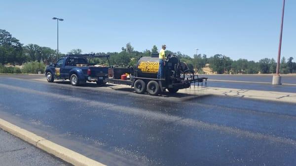 If the application is done rite.  Placing a Seal coat slurry to your parking lot or driveway is a great way to protect your investment.