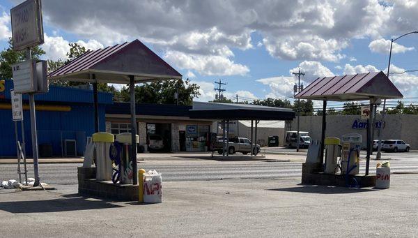 Street view of vacuum cleaners and garbage containers