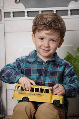 Another bonus - their school photos use props and take multiple pictures using different props and poses!