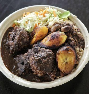 Vegan Oxtail 
Our signature dish 100% Plant based Vegan Oxtail servered with rice/peas and mix cabage w/ plantains.