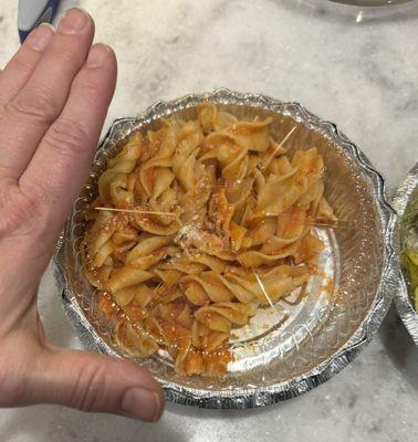 "Penne Pasta with Vodka Sauce" this is what the item looked like when we took our takeout order out of the bag.