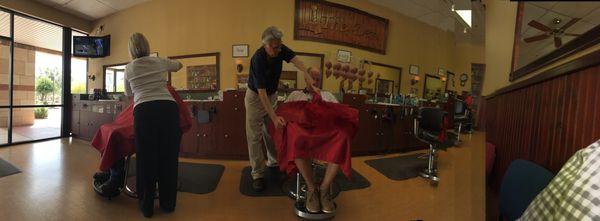 A pano photo of the clean well maintained barber shop. I assumed it was new but it's been there since 2001.