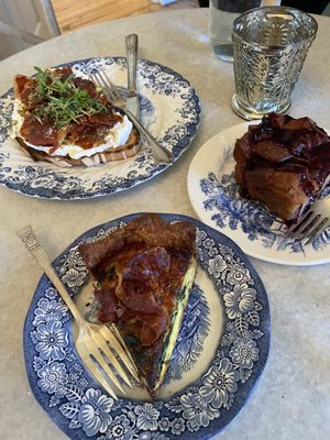 Ricotta toast, seasonal quiche, and mixed berry bread pudding.