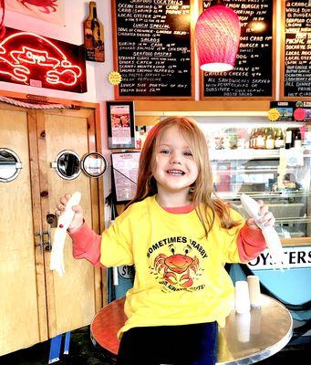 Addy Lynn -- our granddaughter who is a fixture at the seafood market and has her own apron to wait on you or grab your ice... she's 3!