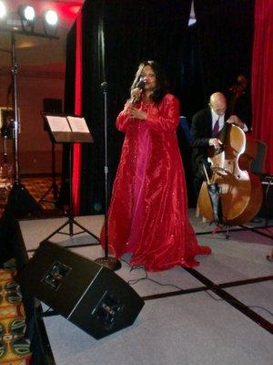 Teri Wilson and company performing at corporate holiday party.