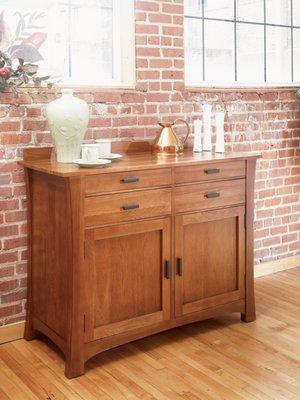 Cattail Bungalow server in a amber finish.