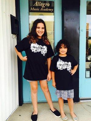 Lizzie and Maddie modeling their new dance tees!