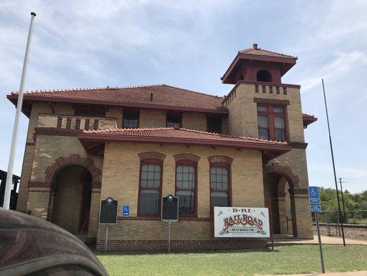 This was an actual depot and a former engineer gives the tour. Trains still run right by it.