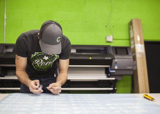 Cody weeding cut vinyl for some decals