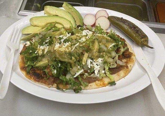 Huaraches  Hand made tortilla, beans, cheese, avocado, salsa, chile, and choice of meat