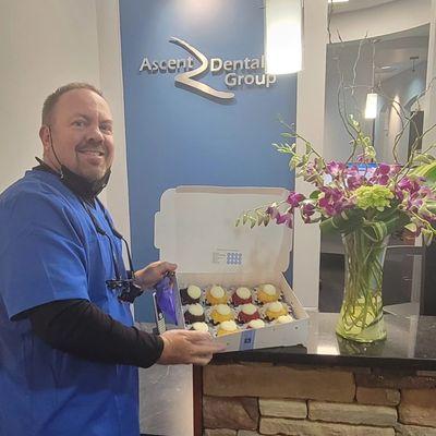 Dr. Johnston enjoying treats from our patients during our Re Grand Opening week! July 14 24' Closed from a flood for 6 months! WE ARE BACK!