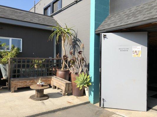 Tri fold entry doors for grand entrances alongside our succulent patio, surrounded by our succulent garden.