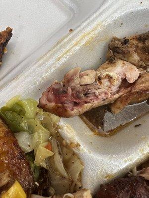 Jerk chicken - chicken was not fully cooked.