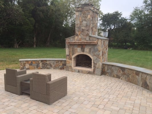 Fireplace and patio outdoor living space.