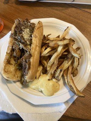 Cheesesteak and fries, still hot when we got it home 15 min later