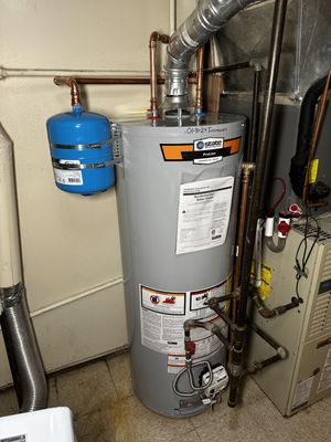 Installation of a new water heater with copper pipes