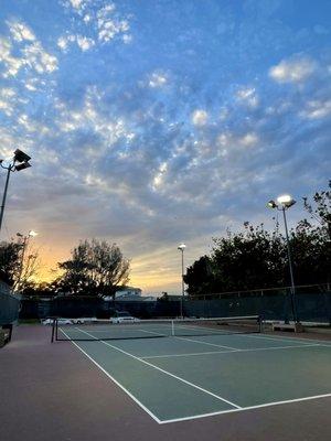 Single tennis court - lights automatically go on close to sunset