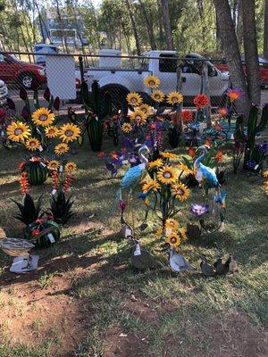 Metal flowers & birds. These are gorgeous and no care needed!