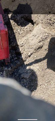 My utility trailer being loaded up, can see all the stone in the pile.