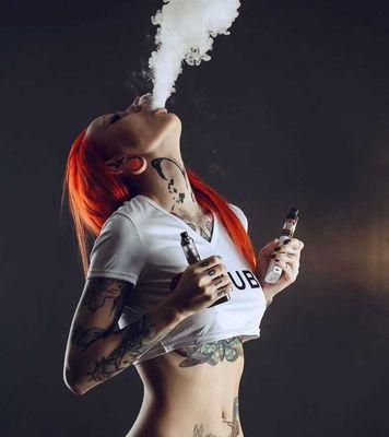 Beautiful girl vaping