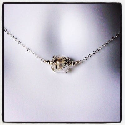 handmade, sterling silver necklace with a real dandelion inside. make a wish.