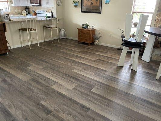 I misspoke, this is luxury vinyl flooring! Gorgeous