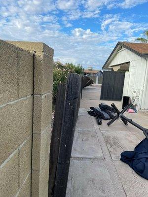 Storm Damage Wood Fence in Phoenix, Az.  Fence Teardown and Junk Removal with Junk Mania