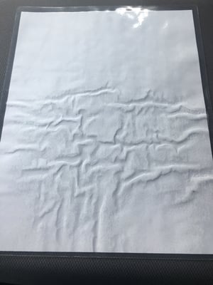 Wrinkled piece of shit lamination x3.