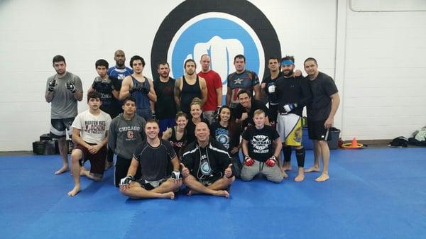 Adult Mixed martial arts classes at Victory. Group shot after a mma compettion team practice.