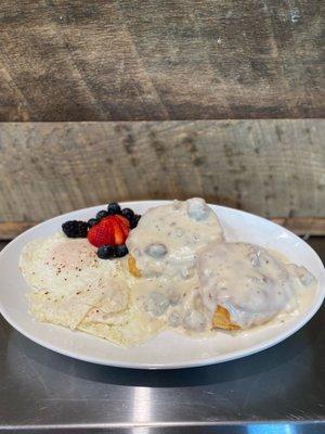 Buttery biscuits topped with scratch made sausage gravy served with eggs cooked of your choice!!