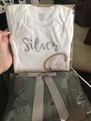 A personalized baby gift. A onesies with a tutu