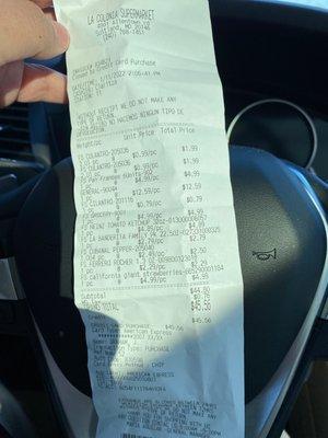 Receipt with outrageous prices for ketchup $4.89,  $2.50 for Ferrero rocher 3 pcs.