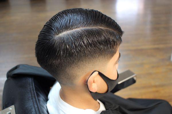 Side part with skin fade
Haircut by Leo