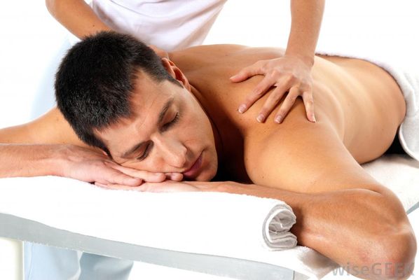 Man getting relaxing massage. Couples are welcomed!