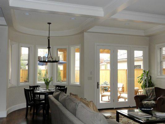 Coffer ceilings, custom trim, and door installation