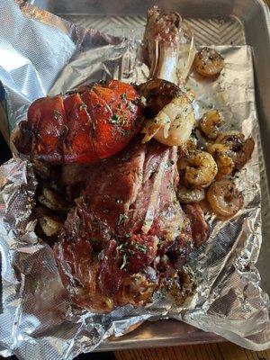 Turkey leg with lobster tail and shrimp